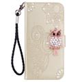 Samsung Galaxy S24 Ugle Rhinestone Lommebok-deksel - gull